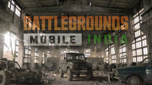 Battlegrounds Mobile India 的戰場場景，廢棄倉庫中有舊車。 — 電玩遊戲 GIF 壁紙