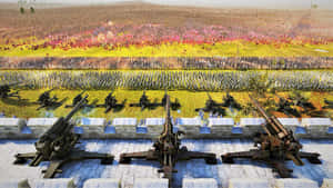 俯瞰廣闊戰場的炮兵陣地，軍隊以色彩繽紛的陣型交戰。 — 蒙古 壁紙
