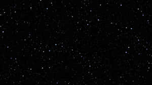 在黑暗背景下，無數閃爍星星的星空夜空。 — 黑色桌面 壁紙