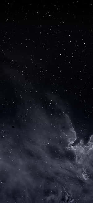 黑暗星雲和星星充滿了無盡的夜空。 — Galaxy A36 壁紙