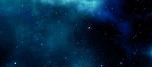 星空，有發光的藍色星雲雲團和散落的星星。 — 宇宙 壁紙