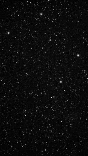 充滿無數閃爍星星的星空夜晚。 — 4K iPhone 壁紙