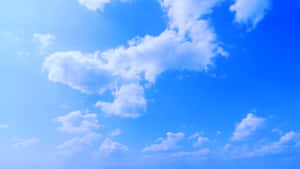 明亮的藍天，散佈著白雲 — 藍天 壁紙