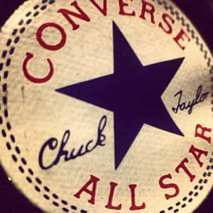Converse Chuck Taylor All Star 標誌布章，紅色文字和藍色星星。 — Converse 標誌 壁紙