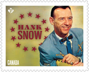 加拿大郵票上的 Hank Snow，身穿藍色西裝和領結。 — 5:4 壁紙