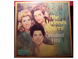 The Andrews Sisters Greatest Hits 的復古專輯封面，三位微笑的女性。 — 音樂 壁紙