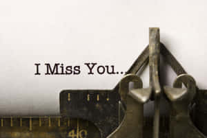 復古打字機，紙上打有「I Miss You...」。 — 孤獨 壁紙