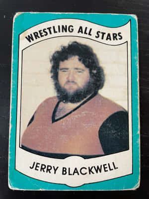 Jerry Blackwell 的復古摔角卡，有鬍鬚和捲髮，身穿棕色背心。 — 運動 壁紙