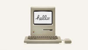 復古米色 Macintosh 電腦，螢幕上顯示 'hello.'。 — 光環 壁紙