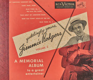 Jimmie Rodgers 紀念專輯的復古 RCA Victor 專輯封面，附有他的肖像和歌曲列表。 — 亞倫·羅傑斯 壁紙