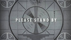 帶有「PLEASE STAND BY」文字和角形網格線的雷達螢幕。 — 異塵餘生 GIF 壁紙