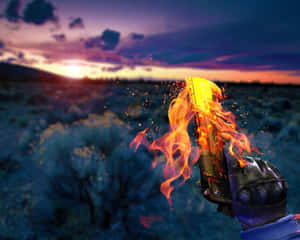 日落時手持火焰槍 — 5:4 壁紙