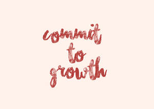 米色背景上以紅色筆觸風格書寫的 commit to growth 勵志文字。
