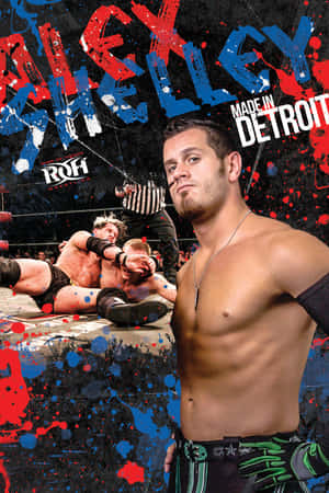 摔角手 Alex Shelley 在擂台上有油漆濺漬和 ROH 標誌 — 湯姆·哈迪 壁紙