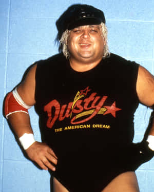 職業摔角手 Dusty Rhodes 身穿他標誌性的黑色緊身衣，帶有紅色星星標誌。 — 小丑 2019 壁紙