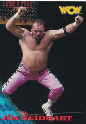 摔角手 Jim Neidhart 穿著粉紅色緊身褲，舉起拳頭躍起半空。 — 運動 壁紙