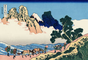 旅客帶著馬匹在戲劇性的山峰和雲層下穿越山路。 — 日式 壁紙