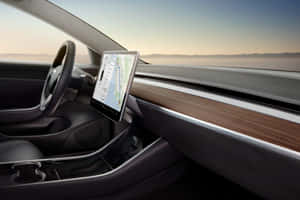 Tesla 車廂內部，觸控螢幕顯示地圖，沙漠日落 — 特斯拉 壁紙
