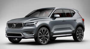 銀色富豪SUV，黑色輪圈和紅色座椅，在工作室燈光下。 — 好看汽車 壁紙