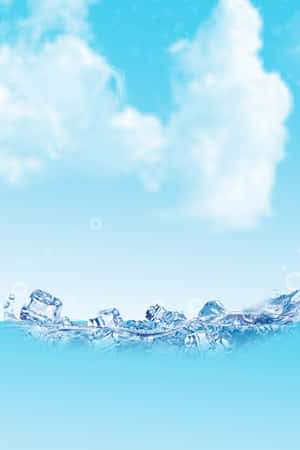 冰塊在清涼的水中漂浮，天空湛藍，白雲點綴。 — 酷寒冬季 壁紙