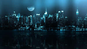 月光下的城市天際線，夜晚摩天大樓倒映在水中。 — 超讚 壁紙