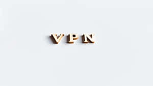 木製字母在白色背景上拼出 VPN。 — 設計 壁紙