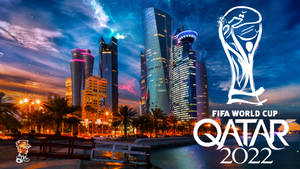 FIFA世界盃卡達2022標誌在夜晚發光的城市天際線上。 — 卡達 壁紙