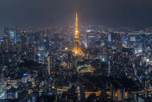 夜晚的東京鐵塔與下方的城市燈光 — 東京 壁紙