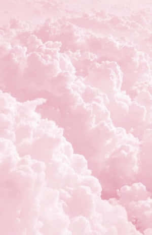 夢幻天空中的蓬鬆粉紅色和白色雲朵 — 粉紅色美學桌面 壁紙