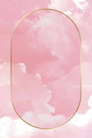 金色橢圓框內有雲朵的粉紅天空。 — 美學雲朵 壁紙