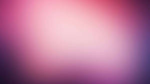 柔和粉紅與紫色漸變漩渦，帶發光中心 — 美學粉色GIF 壁紙
