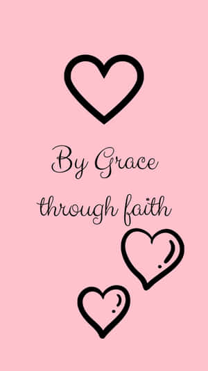 粉紅色背景，黑色心形和斜體 'By Grace through faith' 字句。 — 海灘日落 壁紙