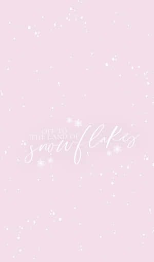 粉紅色背景，帶有飄落的雪花和手寫文字，寫著 off to the land of snowflakes。 — Tecno Megapad Pro 壁紙