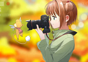 拿著相機的動漫女孩正在拍攝一隻戴著圍巾的小飛鼠。 — 庫洛魔法使 壁紙