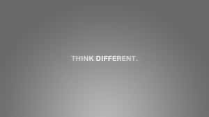 灰色漸變背景，白色文字寫著 think different — 火箭 壁紙