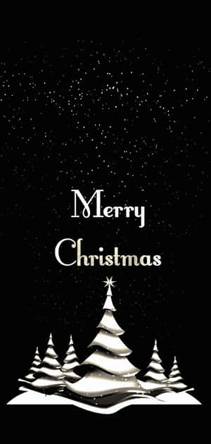 星空下雪覆蓋的松樹與Merry Christmas文字。 — Honor 600 壁紙