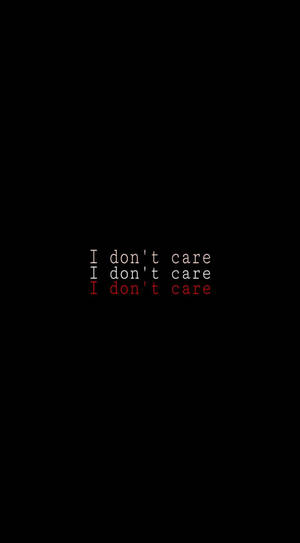 文字桌布，黑色背景上以白色和紅色顯示「I don't care」。 — 我不在乎 壁紙