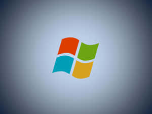 Microsoft Windows 標誌，四個彩色窗格在漸變背景上 — 復古90年代風格 壁紙