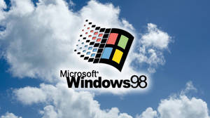 Windows 98標誌在藍天白雲背景下 — 洛米安傳奇 壁紙