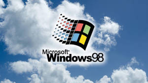 Windows 98標誌在藍天白雲背景下。 — Windows 98 壁紙