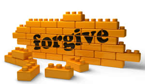橙色LEGO積木拼出forgive，周圍散落著一些積木。 — 慈悲 壁紙