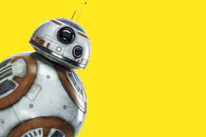 BB-8機器人，銀色和橙色面板，黃色背景。 — 迪士尼桌布 壁紙