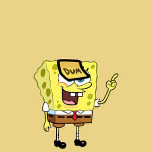 海綿寶寶戴著「DUM」帽子，笑著向上指。 — 卡通 壁紙