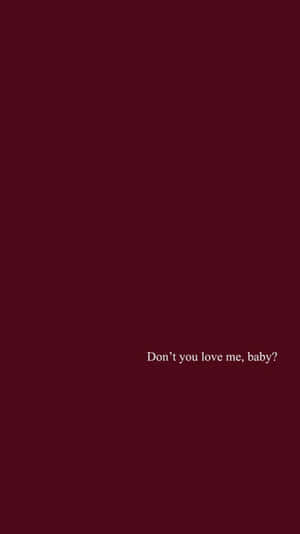栗色背景，白色文字問 don't you love me baby — 低對比 壁紙