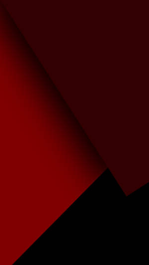 抽象數位藝術，具有大膽的紅色和黑色幾何形狀及漸變過渡。 — 紅色美學 iPhone 壁紙