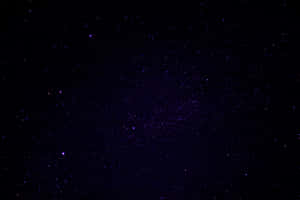 帶有紫色調和散落星星的星空。 — 星空動畫 壁紙