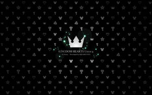 Kingdom Hearts Union X 標誌，發光皇冠被圖標環繞在黑色背景上