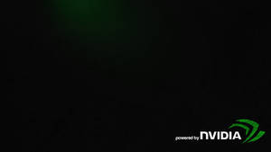 NVIDIA標誌在深色紋理背景上發出綠色光芒。 — Nvidia GIF 壁紙