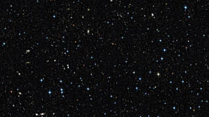 夜空中廣闊的恆星和星系場。 — 星星 壁紙