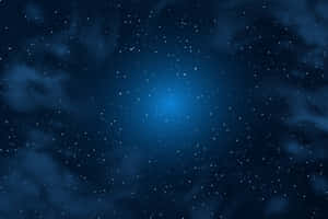 繁星點點的夜空，帶有發光的藍色星雲和散落的星星。 — MacBook Air 壁紙